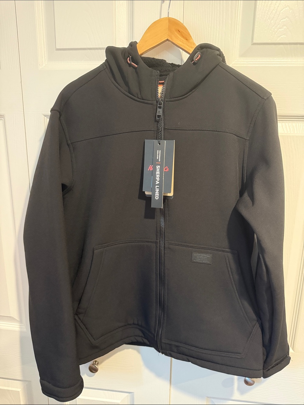 Hawke & Co Outfitter Adirondack Sherpa Lined Jacket featuring a cozy sherpa fle